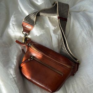 Fairly made, sustainable leather fanny pack with adjustable strap.